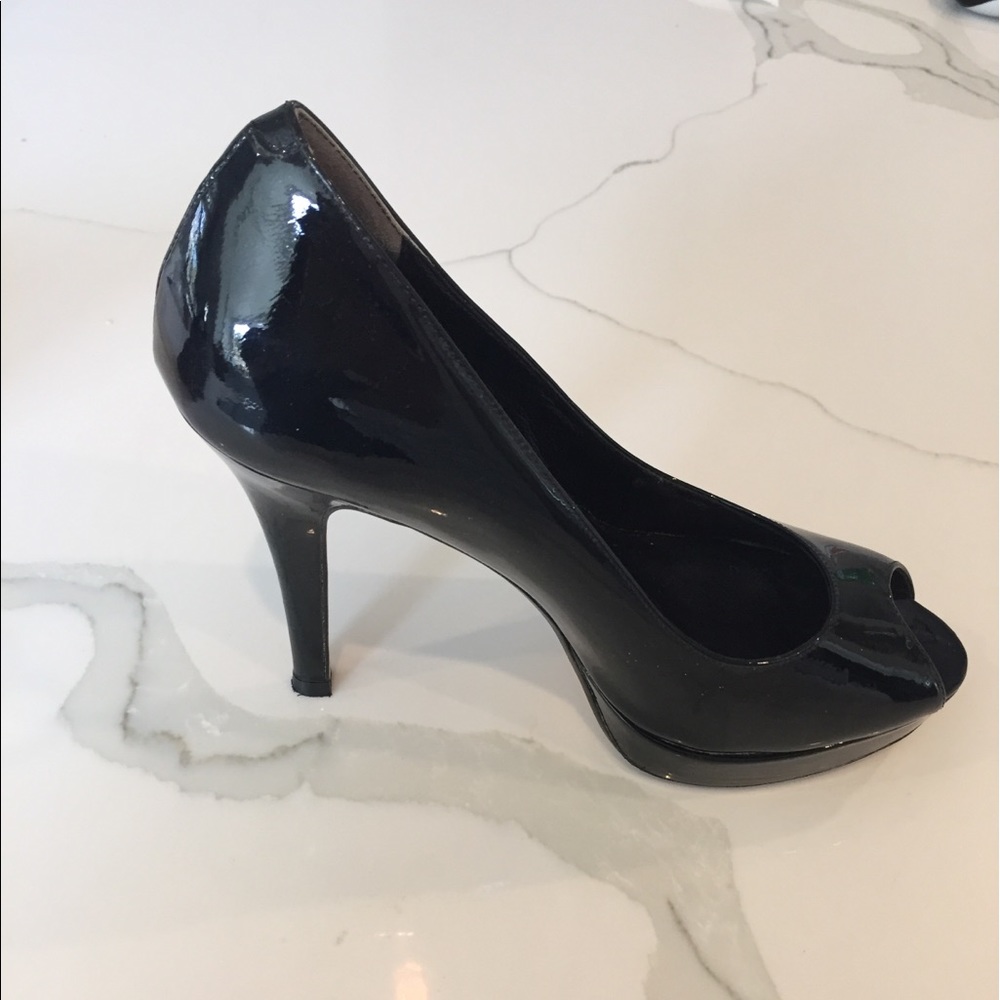 Cole Haan black patent platform pumps